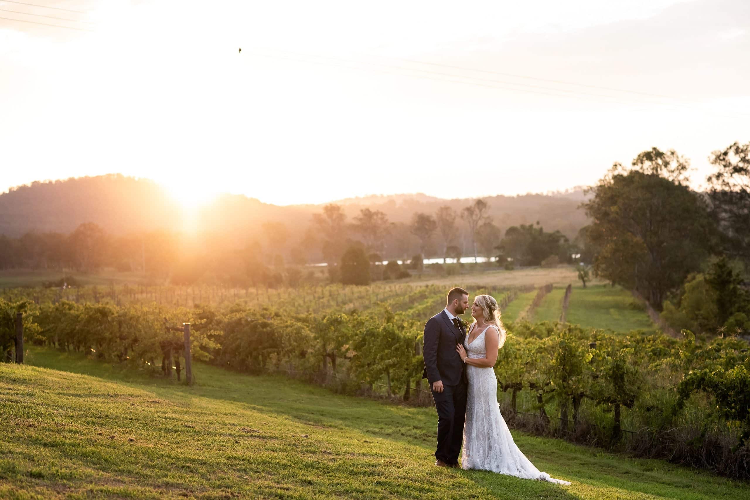 Albert River Wines, Tamborine with bride and groom at sunset.