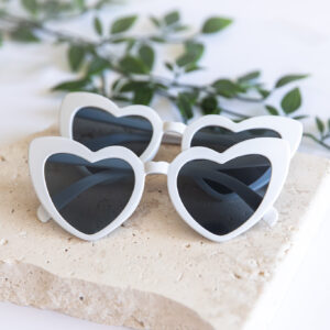 White wedding sunnies perfect for wedding photos and photo booths.
